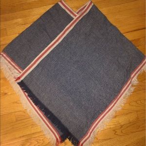 Red, cream, and blue lightweight sweater poncho